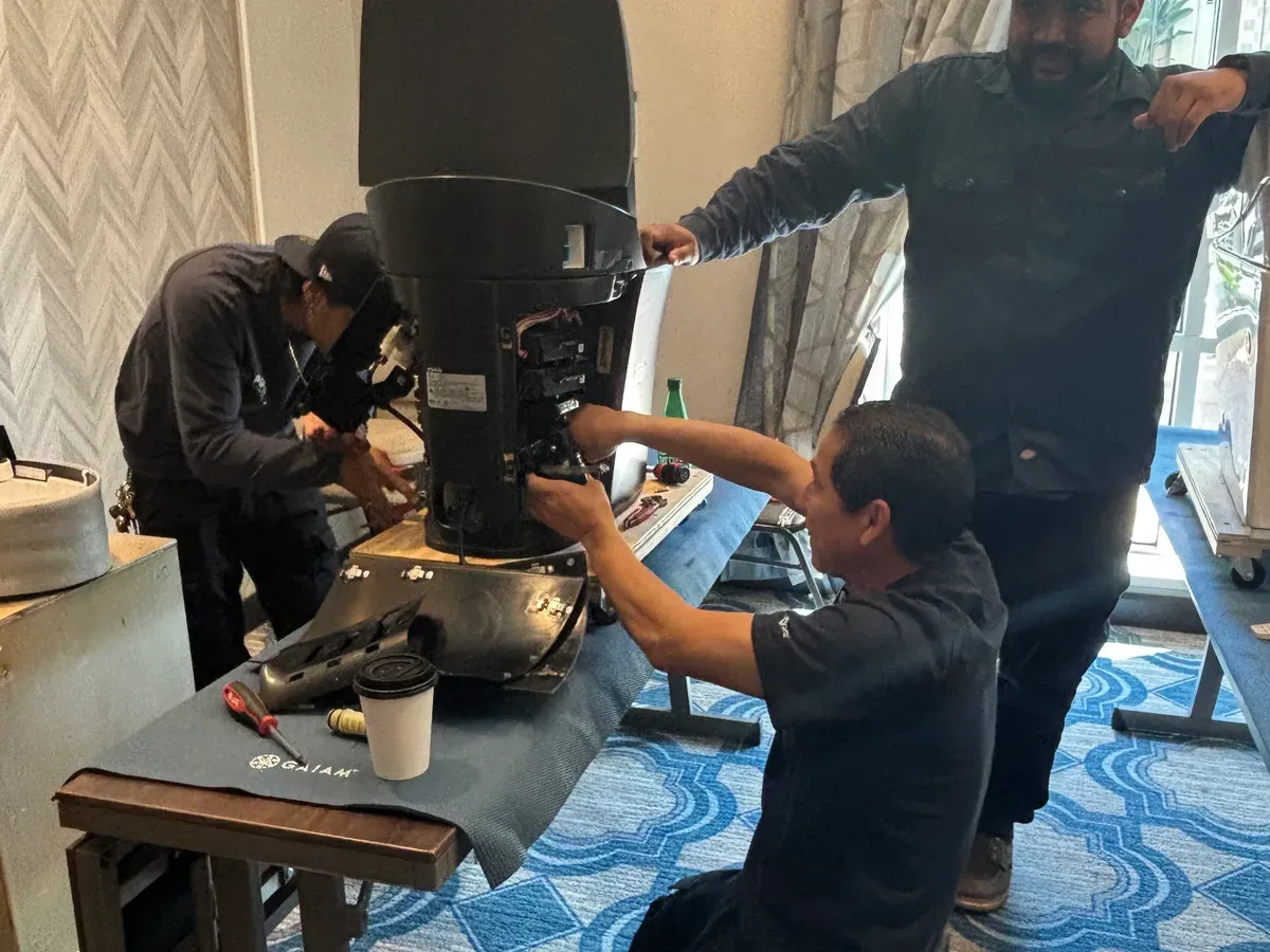 Mr. Pipe technicians servicing a Kohler intelligent toilet on site
